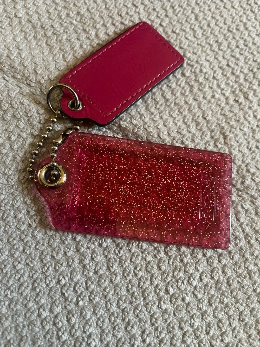 Choice of Coach Glitter & Leather Poppy Hangtags
